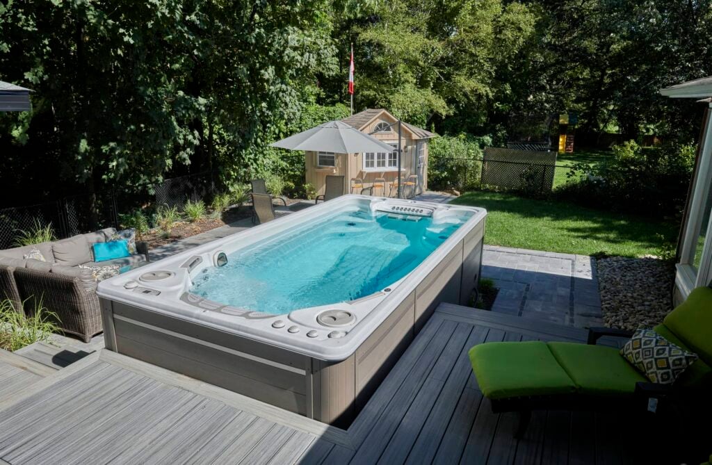 Backyard Swim Spa Installation Guide in Utah - Red Rock Spas Blog Hydropool Backyard Swim Spa lifestyle